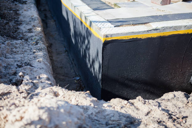 Professional Waterproofing technician working in Bladensburg, MD
